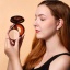73759-website__format_jpg-421xx_bronzing-powder-compact_person.jpg